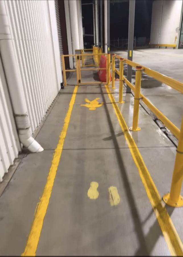 Warehouse pedestrian walkway after cleaning